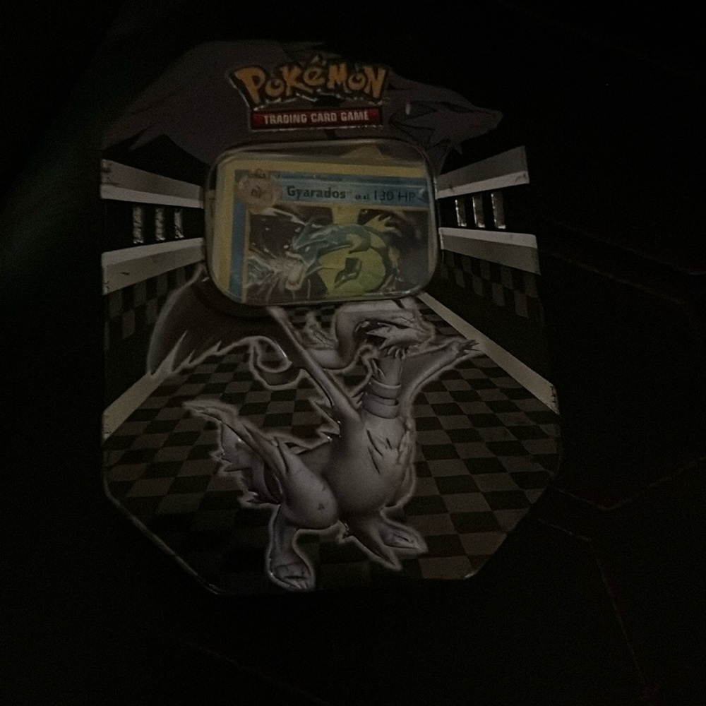 Tin full of 2016 pokemon cards